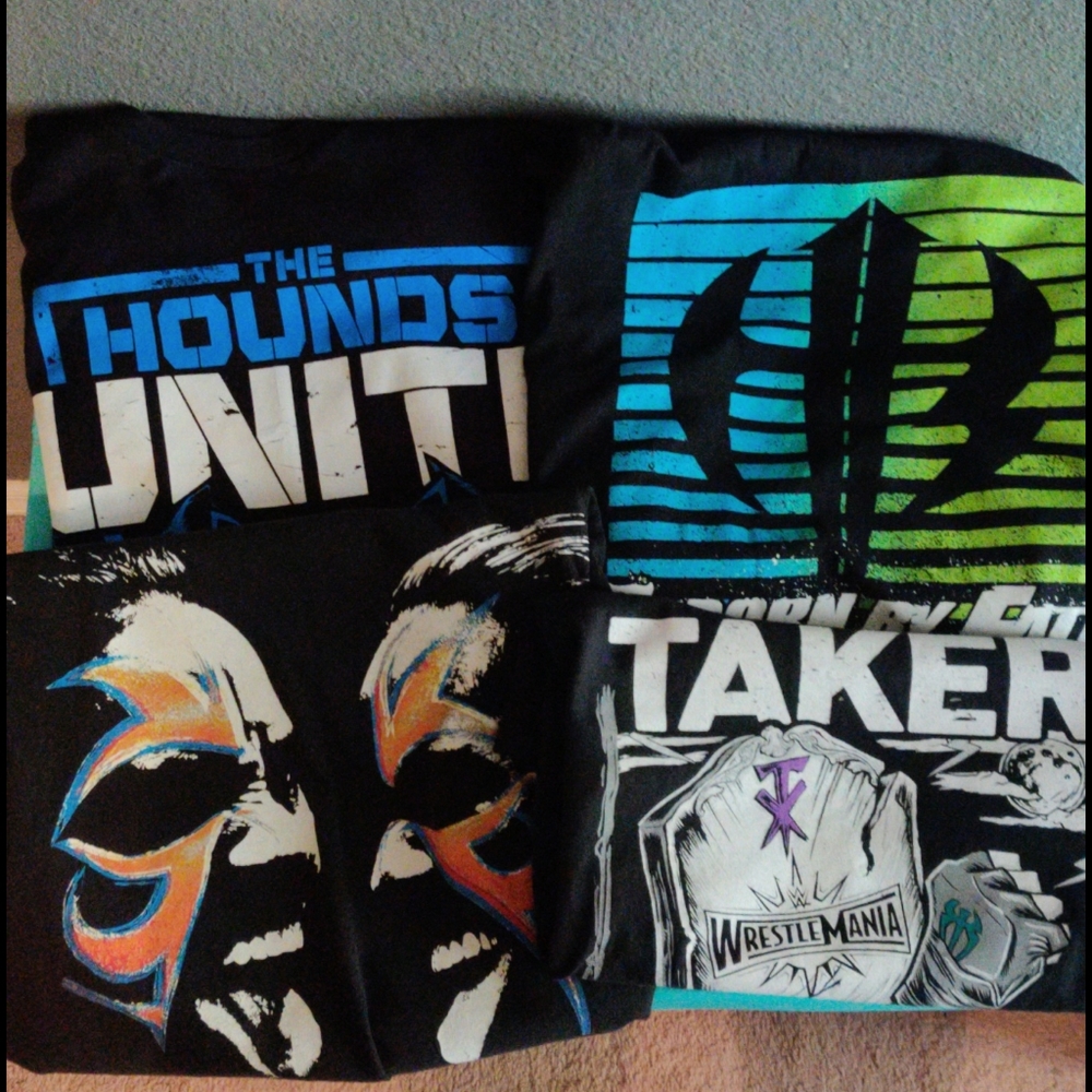 Bundle of 4  WWE shirts